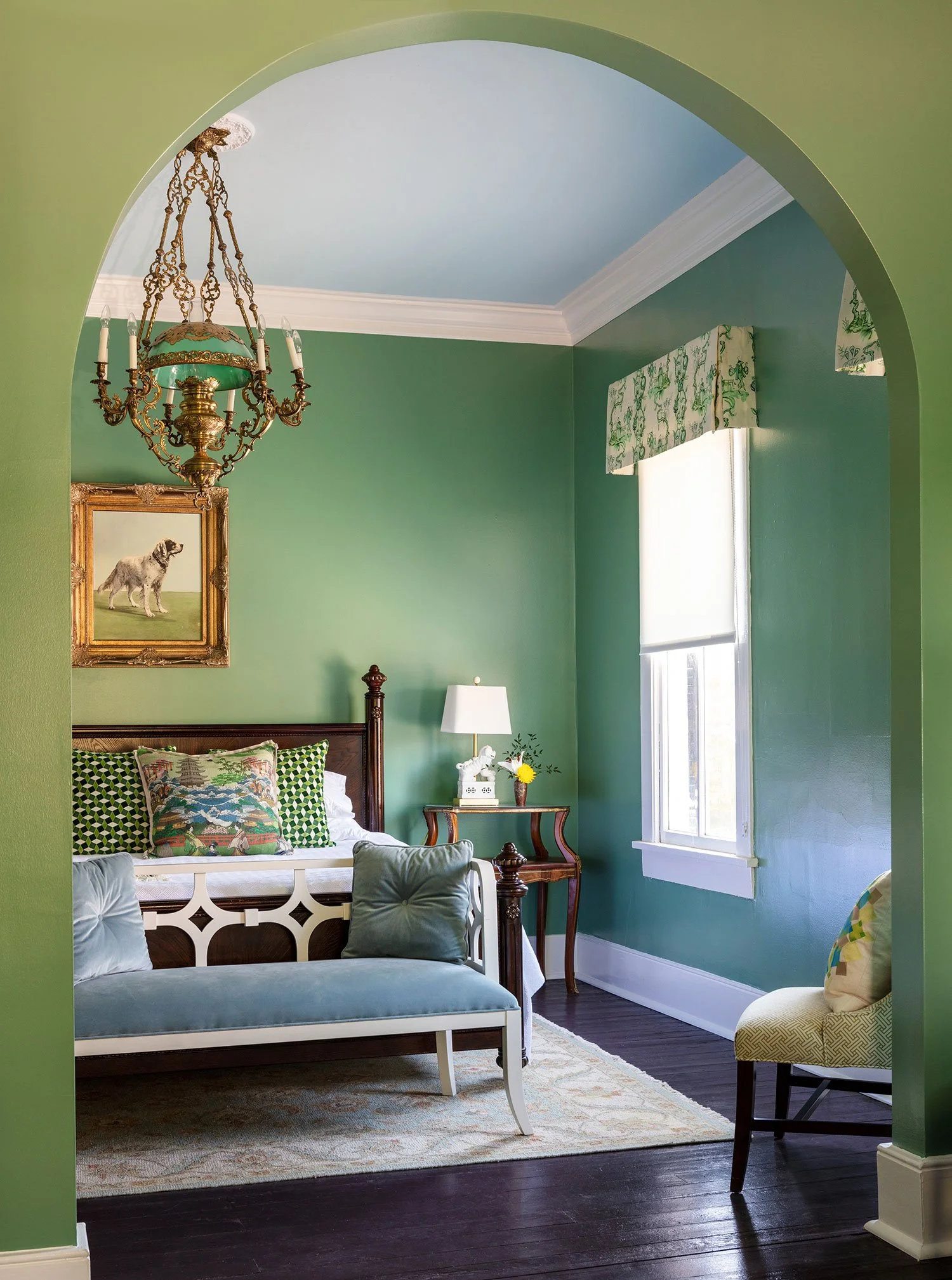 The Muddy Waters Suite with green arch and antique chandelier